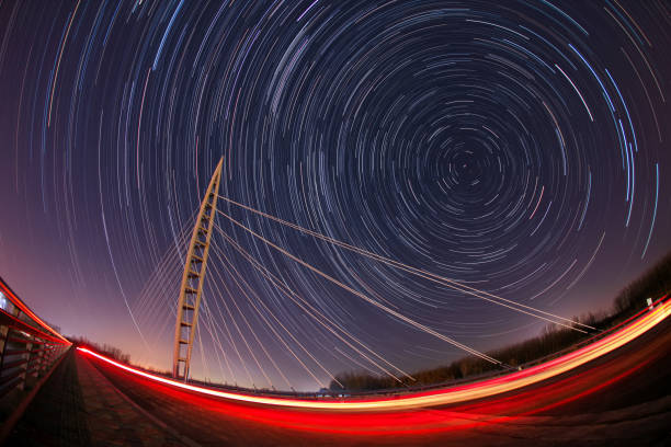 istock Bridges and star tracks at night 1196272705