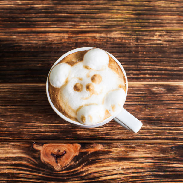istock cup coffee on wood table in top view 1196275469