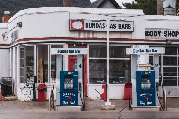 Old School Gas Station Little Portugal - Dundas St. - Toronto - Ontario - Canada Toronto, ON 12/27/2019: Street scene of old school style gas station in Little Portugal. Quiet gas station reminiscent of a 1950s style garage. sustainable energy toronto stock pictures, royalty-free photos & images