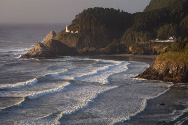 istock Heceta Head Lighthouse and Waves at Sunset 1196281004