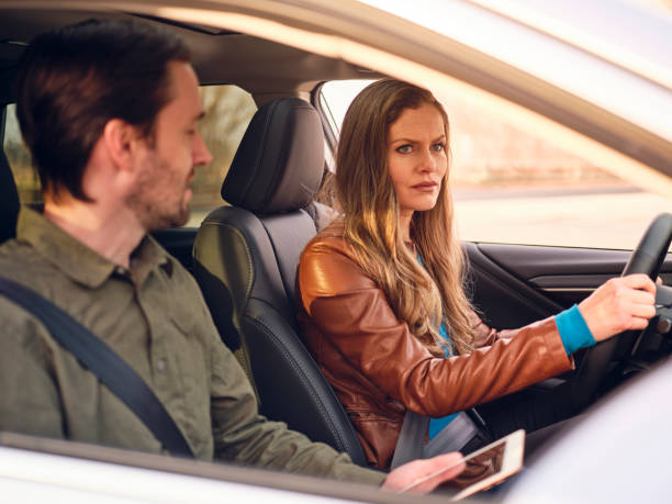 istock Adult Couple Driving a Car 1196283208