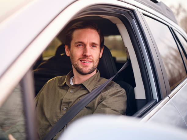 istock Adult Man Driving a Car 1196283254