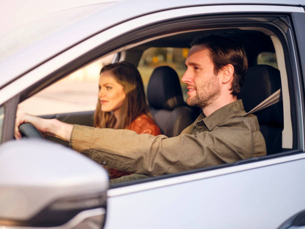istock Adult Couple Driving a Car 1196283786