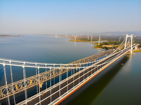 Zhangjiakou City, Hebei Province, China-September 28, 2019: The Grand Guanting Lake Bridge of Jingzhang Highspeed Railway is under final construction for formal business operation. Jingzhang Highspeed Railway is a newly constructed railway connecting Beijing and Zhangjiakou, both of which are the hosting cities of 2022 Winter Olympics. The designed speed of it is 350 km per hour and the service is scheduled to start on December 31, 2019.