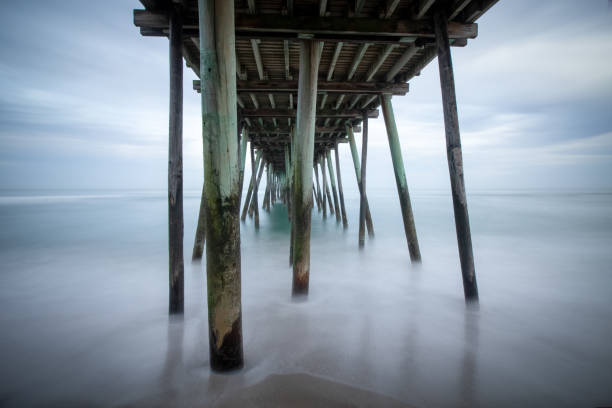 istock low tide at the pier 1196296692
