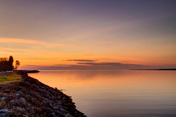 sunset glow view at the estuary where river meets sea