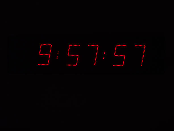 istock Red Digits of Race Clock at Black Background 1196299565