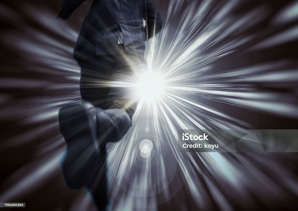Back view of a businessman running towards a goal Businessman Stock Photo