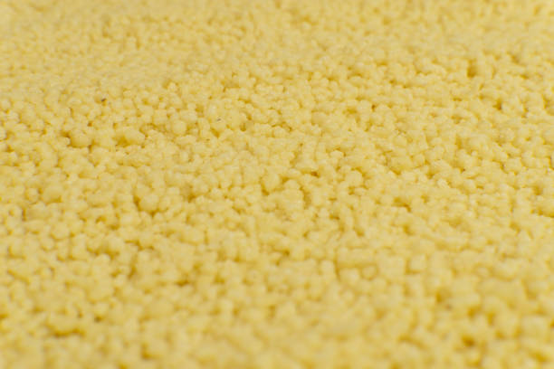 istock Couscous filling frame making a food texture or background. 1196301599