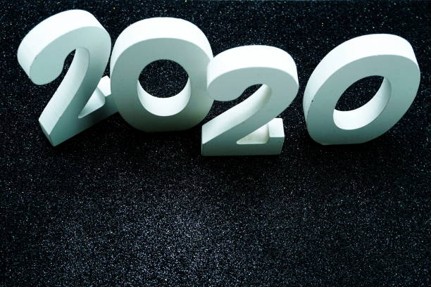 istock Happy New year 2020 with space copy on black glitter background 1196303696