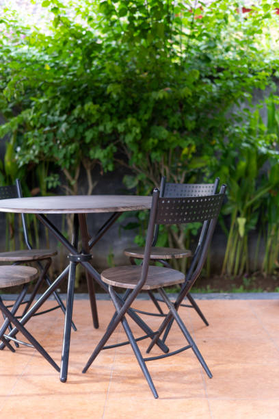 istock Metal chairs and table in gazebo on backyard 1196306781