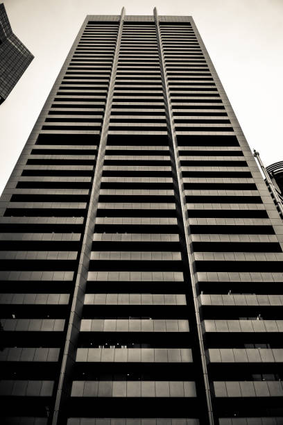 istock Singapore Office Building Facade 1196307433