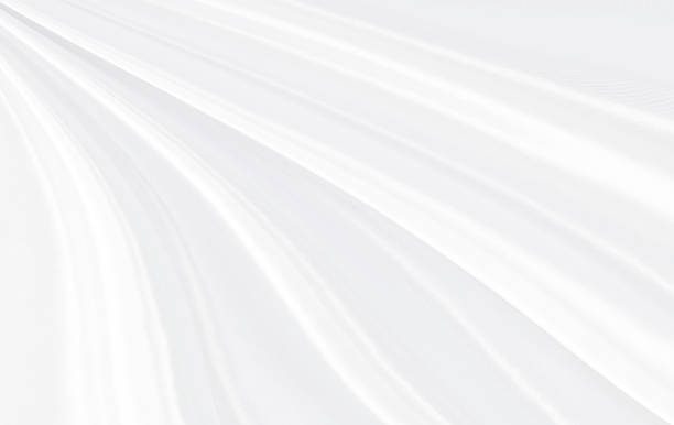 istock White gray satin texture that is white silver fabric silk background with beautiful soft blur pattern natural. 1196310896
