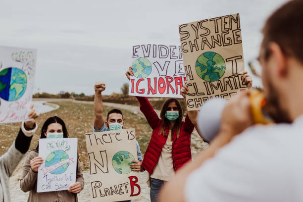istock People with placards and posters on global strike for climate change 1196316444