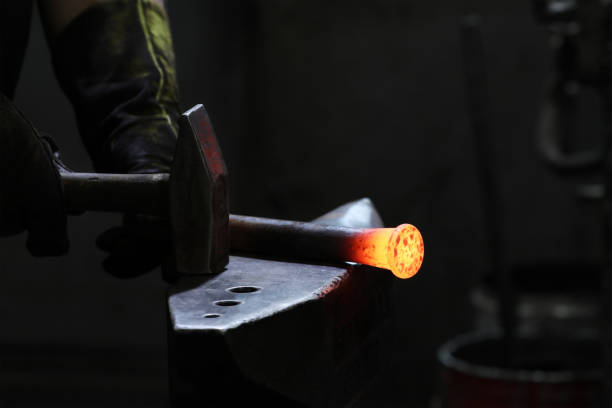 istock A blacksmith is working. Blacksmiths produce objects such as gates, grilles, railings, light fixtures, furniture, sculpture, tools, agricultural implements, decorative and religious items. 1196318868