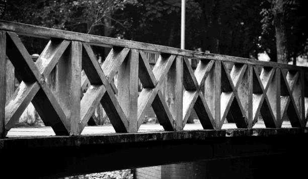 istock Wooden made traditional bridge around a park 1196322554