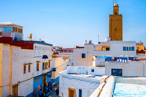 View of the old part of the medina with blue-white walls from the roof of a traditional building in the city of Rabat, Morocco