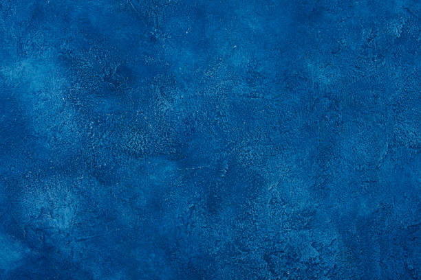 istock Marble or concrete background of classic blue color 1196325418