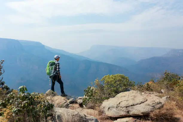a man traveler with panorama view in bylde river canyon, South Africa