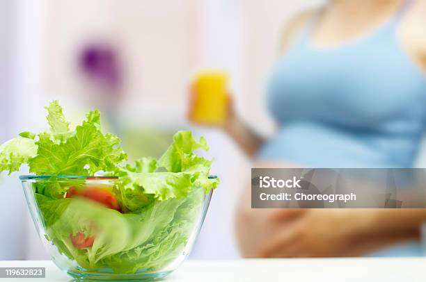 Pregnant Woman Eating Healthy Food Stock Photo - Download Image Now - Adult, Adults Only, Anticipation