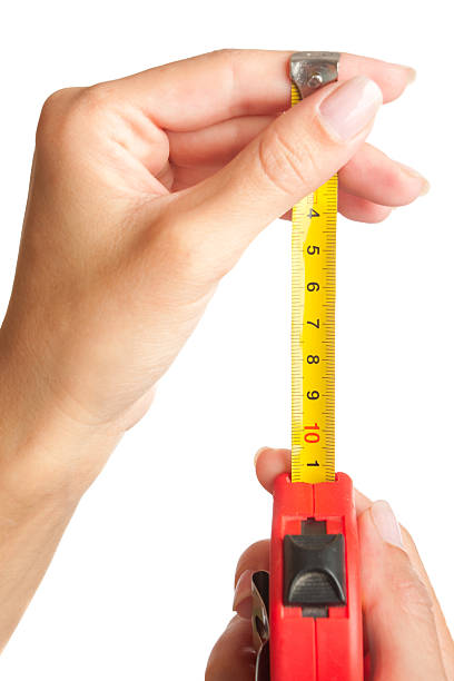 istock Tape measure in hands 119632906