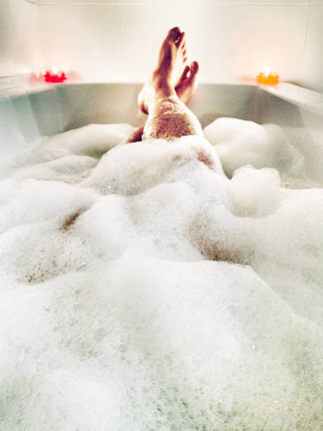 istock male relaxing in a bath tub 1196329136