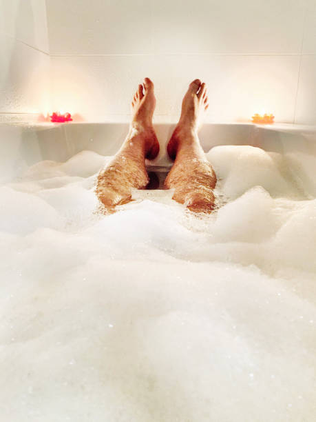 istock male relaxing in a bath tub 1196329162