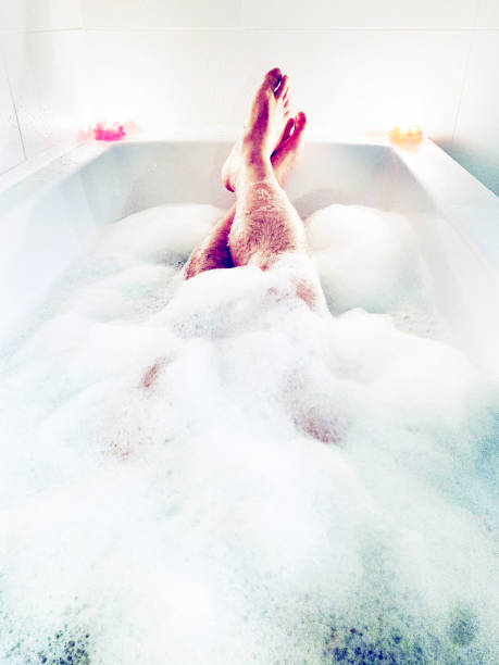 istock male relaxing in a bath tub 1196329180