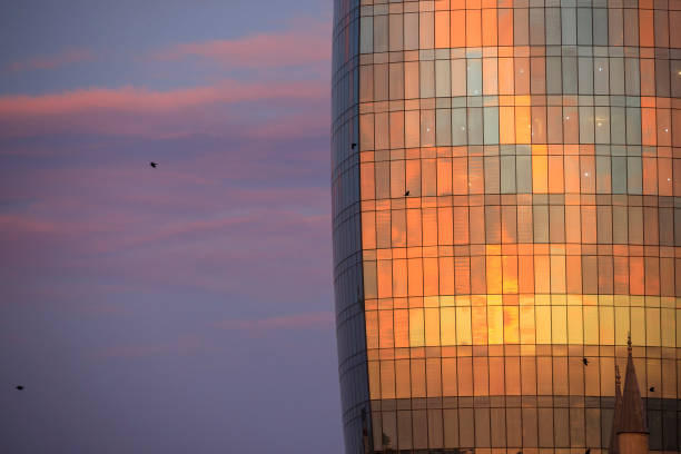 istock Sunrise Reflection Glasses Modern Building 1196330226
