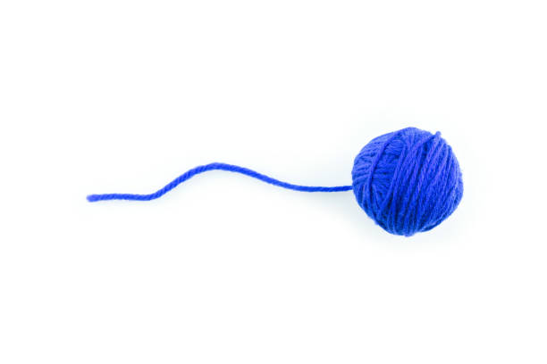 istock yarn color blue on white background. 1196334623