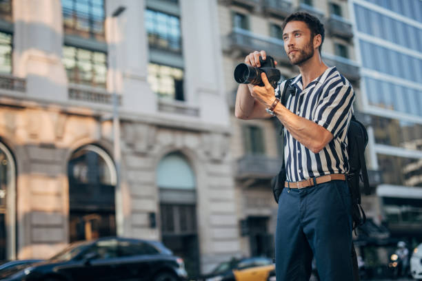 istock Photographer on the street 1196334822