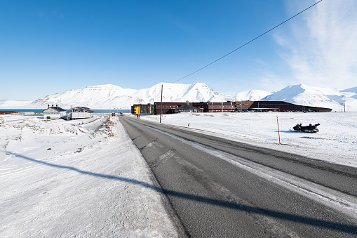 This image was taken in the main road of Longyearbyen in the northern Norway.\nIt comes with the magnificent Arctic landscape on the background!