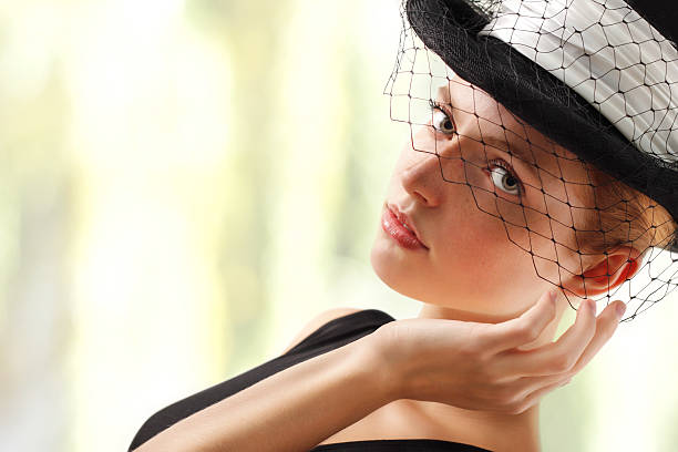 istock elegant young woman 119633760