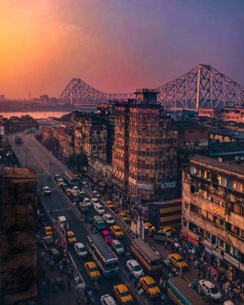 View of Howrah Bridge from Burrabazar Howrah Bridge is one of the icon of Kolkata. This photo is taken from Burrabazar Market during Sunset.
I took this shot using D5600 with 18-55 mm. kolkata stock pictures, royalty-free photos & images