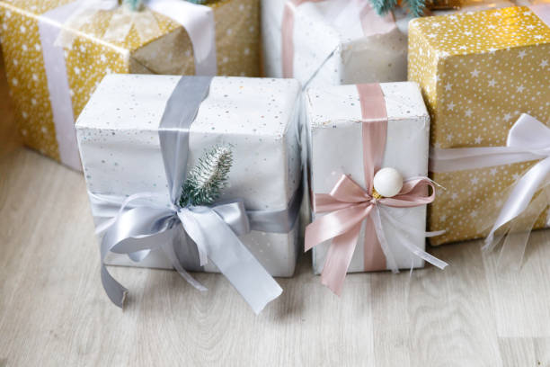 istock Beautiful Christmas tree decorated with toys and gift boxes 1196338978
