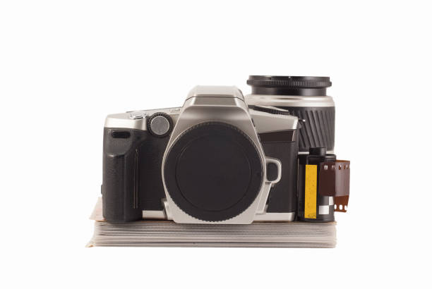 istock 35 mm analog camera on a white background. Film camera. 1196339046