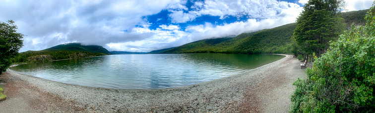 an early morning view of a serene lake in the Tierra del Fuego National Park.