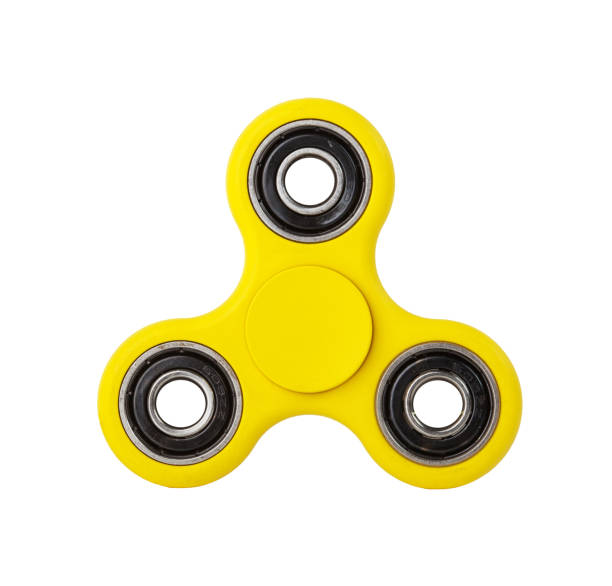 istock Close-Up Of Fidget Spinner Against White Background 1196344166