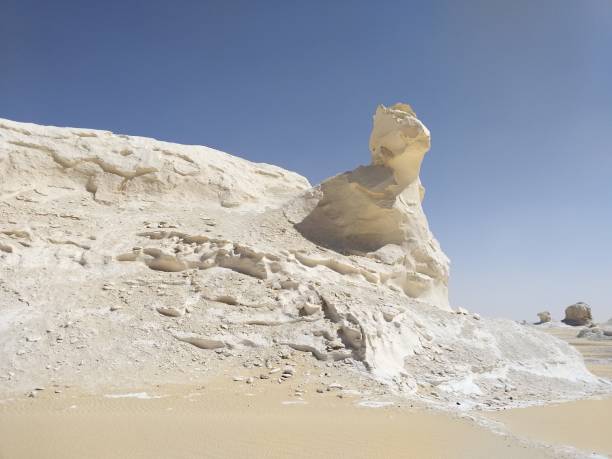 istock Farafra (White Desert), a geological depression covered by chalk rock formations in Egypt 1196345623