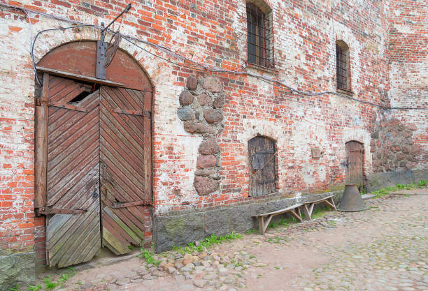 istock wall and doors of the old fortress 1196350328