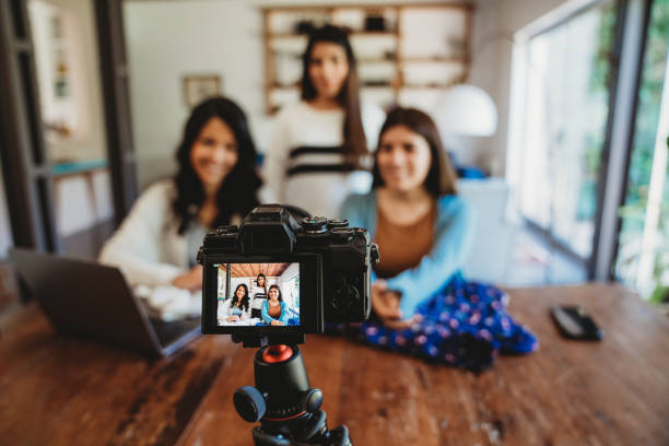 istock Three young adult women vlogging together 1196352277