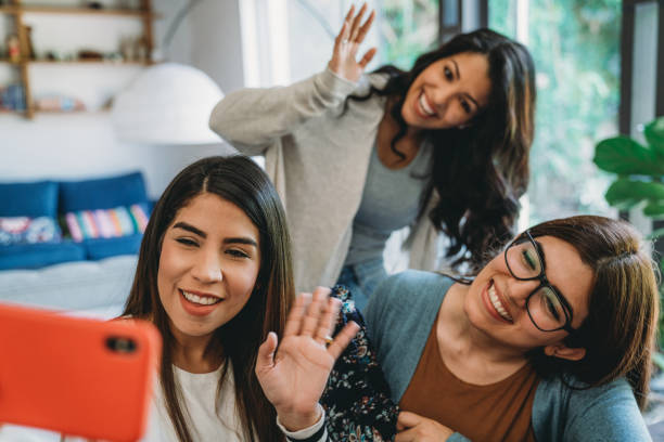 istock Three friends taking a selfie together 1196352292