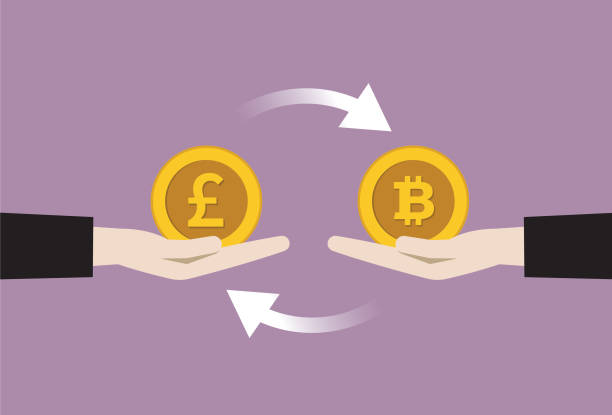istock Businessman exchange currency between UK pound coin with Cryptocurrency coin 1196354807