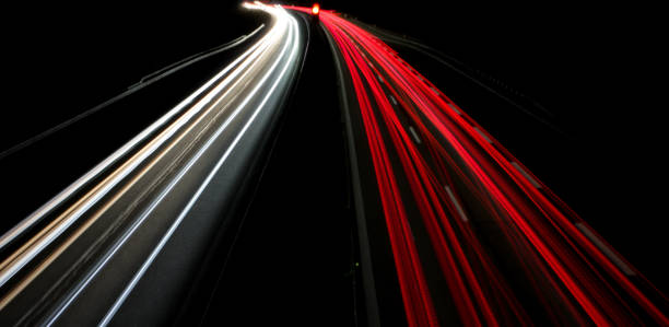 istock long exposure road traffic night lights spotlight 1196356231