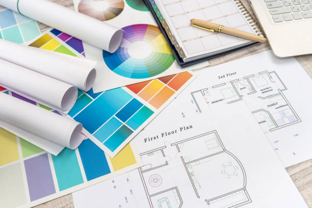 istock Top view of architectural blueprints  with material sample on creative desk 1196362116