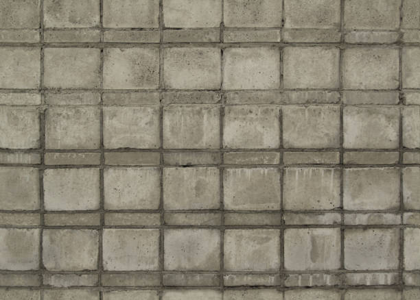 istock Old concrete wall. Concrete blocks texture. Seamless. Close-up. 1196364066