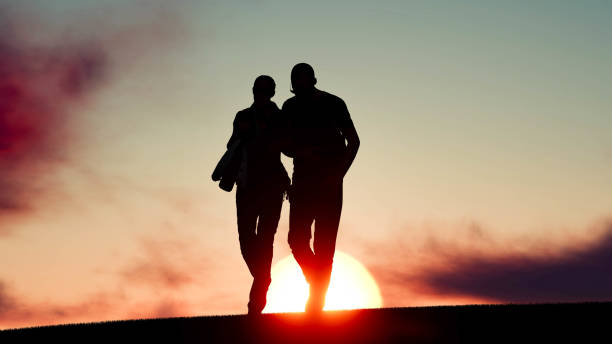 istock falling in love silhouette at sunset 3D Rendering 1196369134