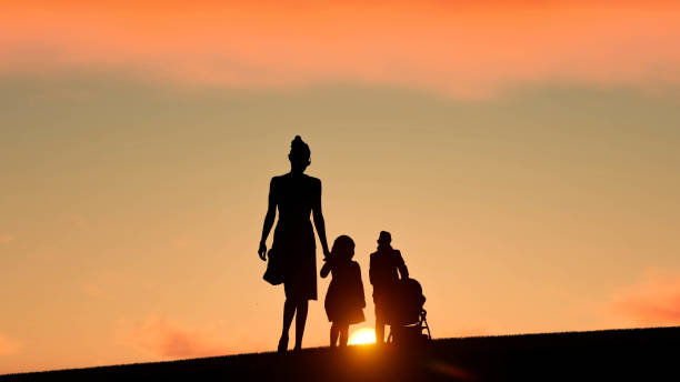 istock Family silhouette at Sunset 3D Rendering 1196369136