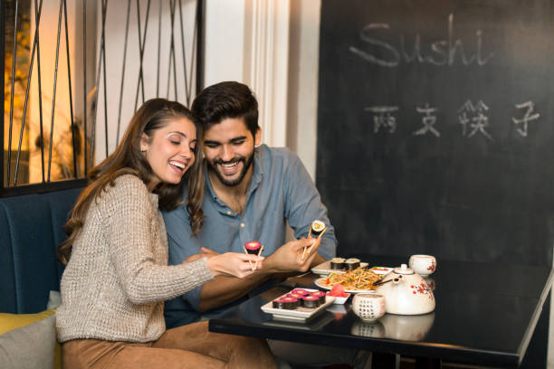 istock Couple in an Asian restaurant 1196373181