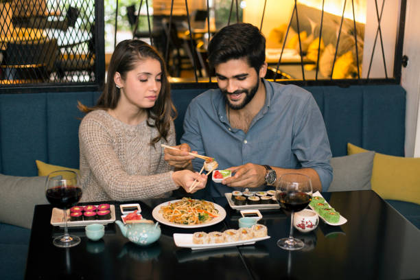 istock Couple in an Asian restaurant 1196373233